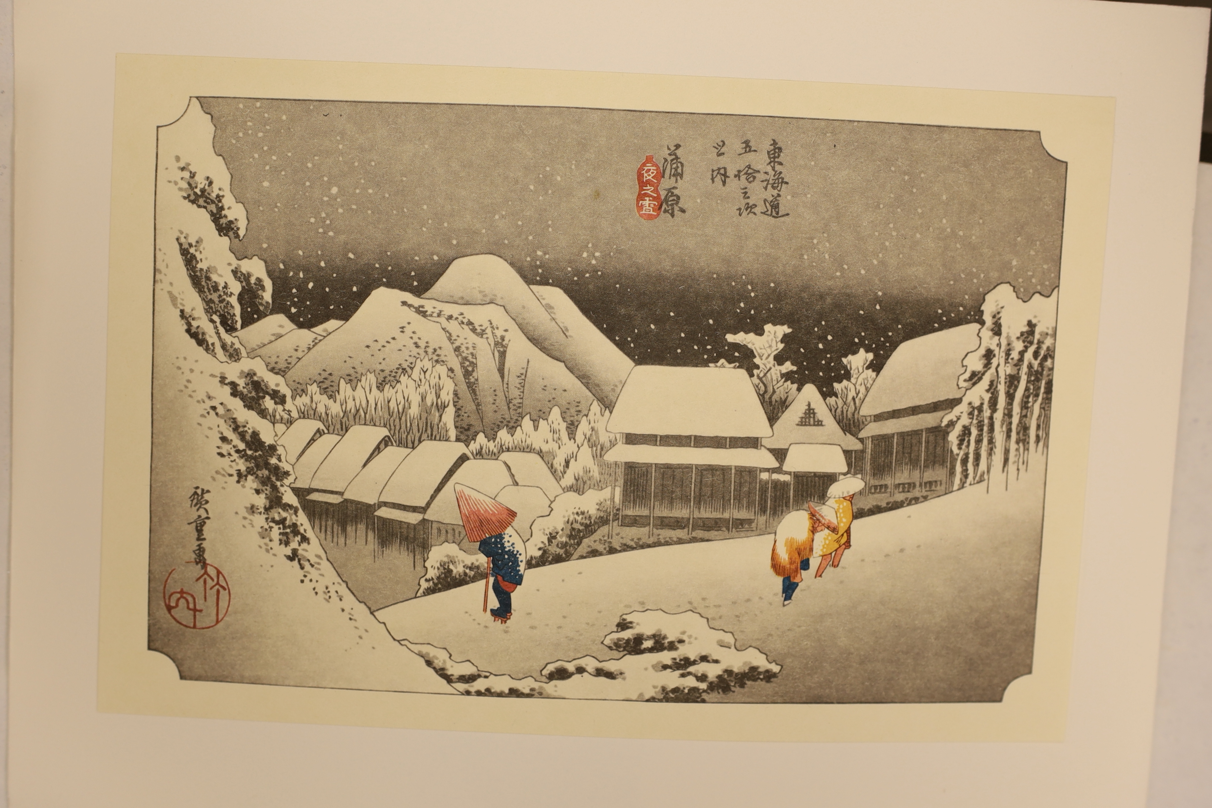A group of reproduction Japanese woodblock prints, generally 16 x 24cm, in folder